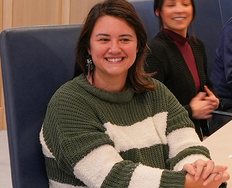 Alissa Smiling in the HQ Conference Room