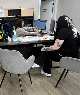 Residents being helped at one of Montium's apartment communities.